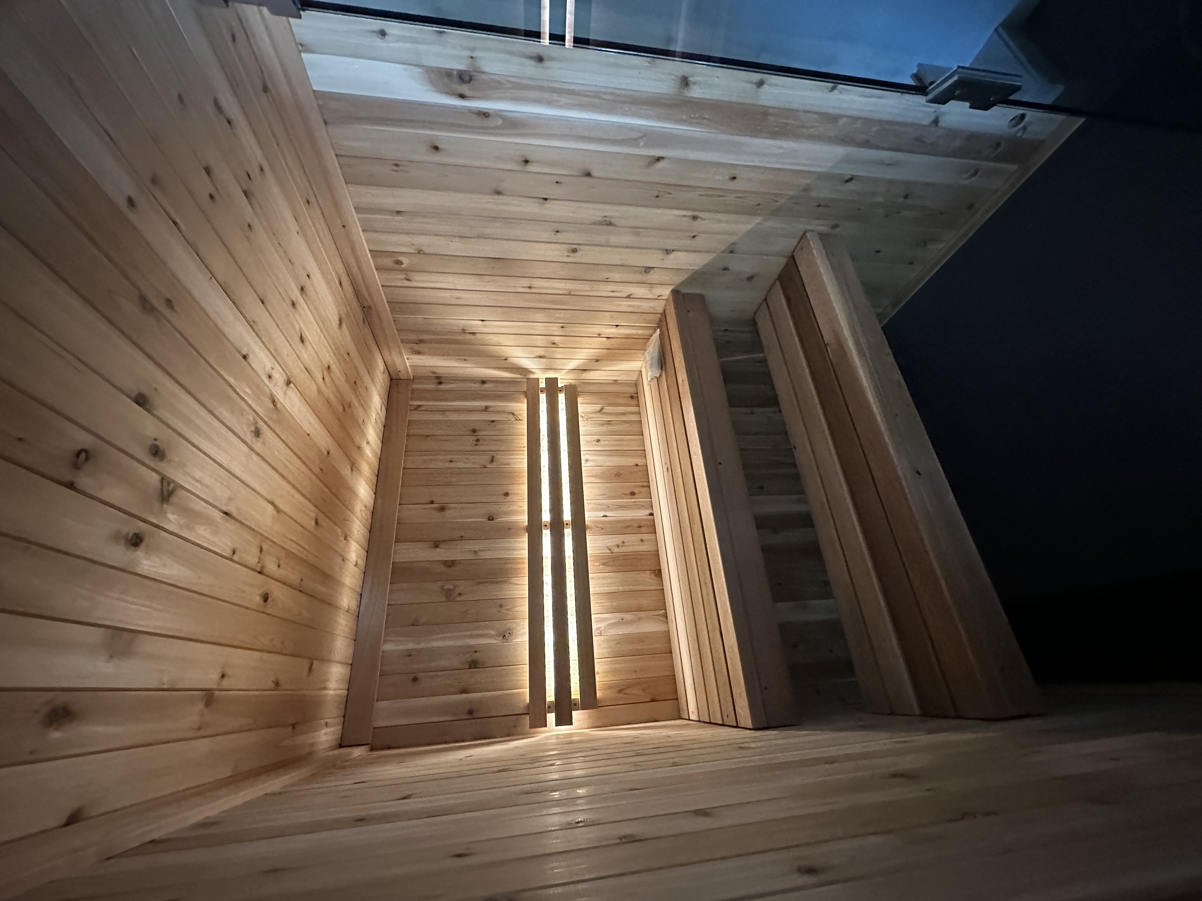 Cedar sauna panel installation