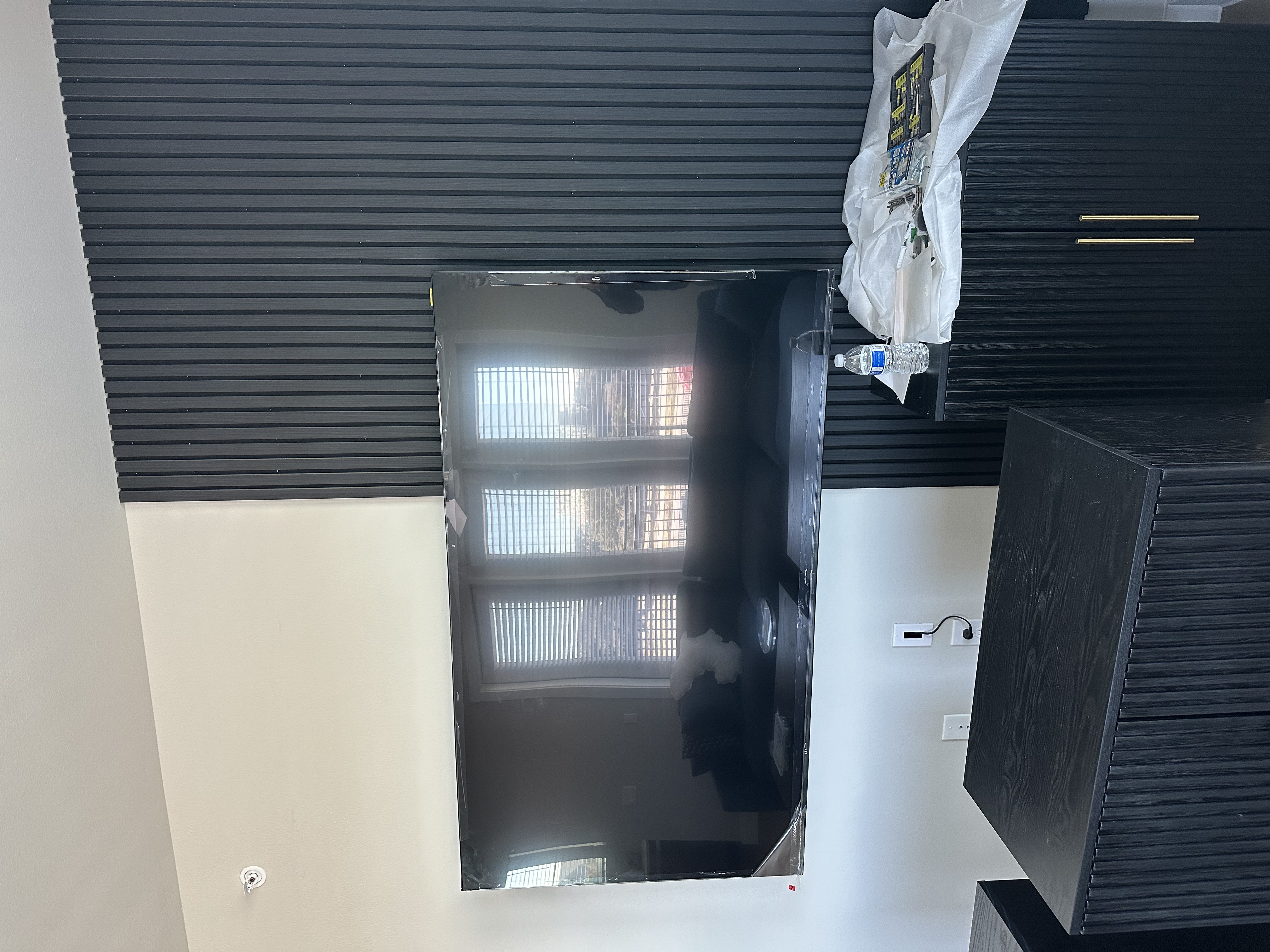 Slat wall with TV mounted